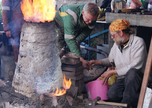 Image of people using a kiln