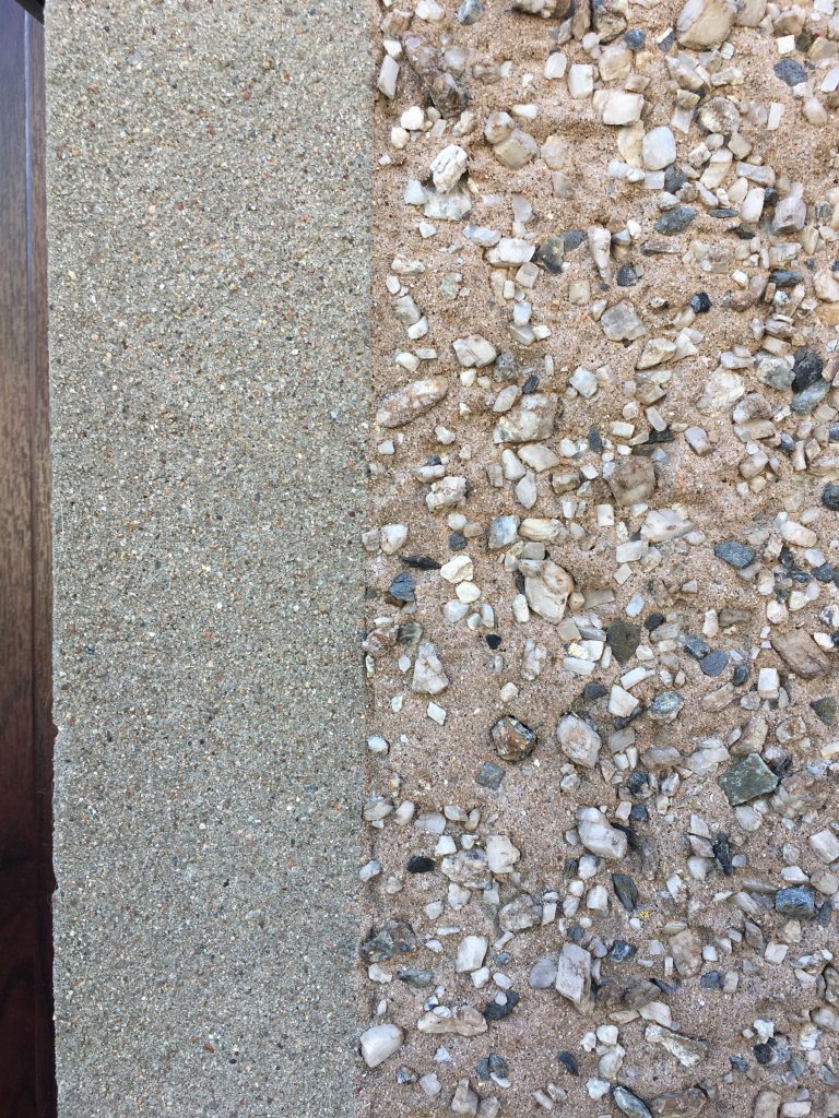 close up of two types of pebbledash walls next to each other