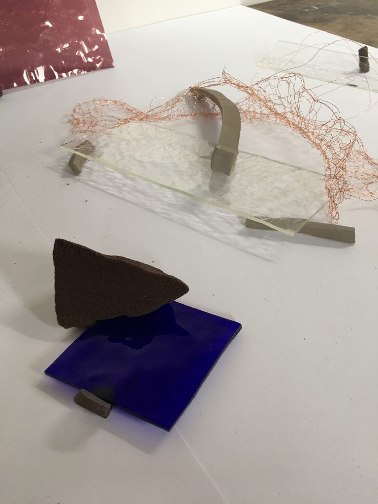 experiments in the studio with glass, clay, wire and resin bonded sand